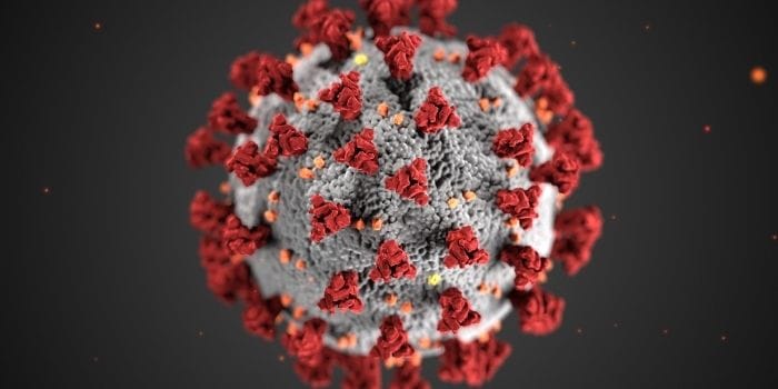 Detailed 3D rendering of the COVID-19 virus showing spike proteins on its surface, emphasizing the importance of immune health and alternative approaches to COVID prevention.